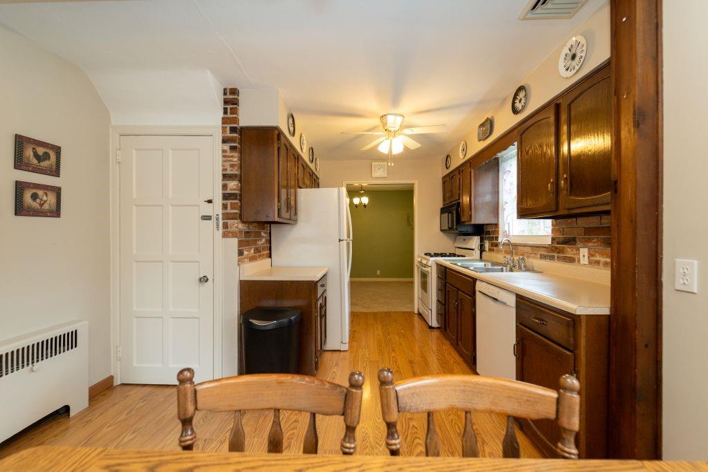 1446 Kinmount Street Pittsburgh, PA 15205 - Photo 9 of 38 a bathroom with a sink and a mirror