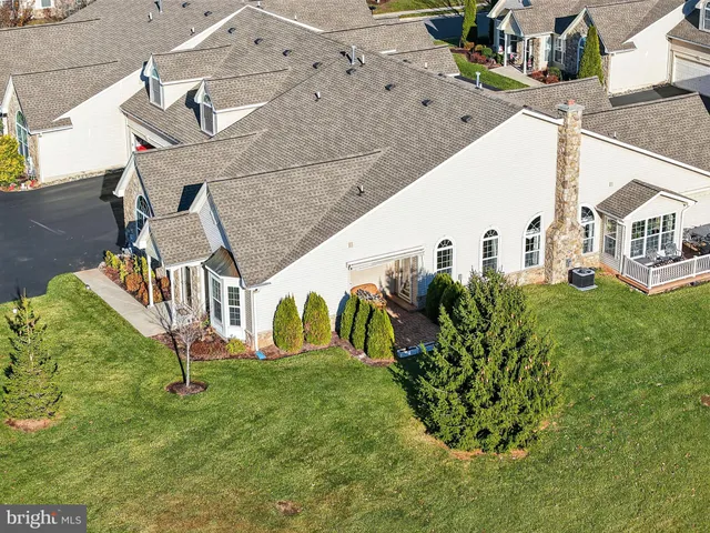 an aerial view of a house with garden