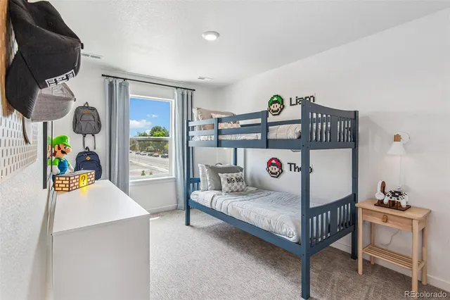 a bedroom with furniture and a bed