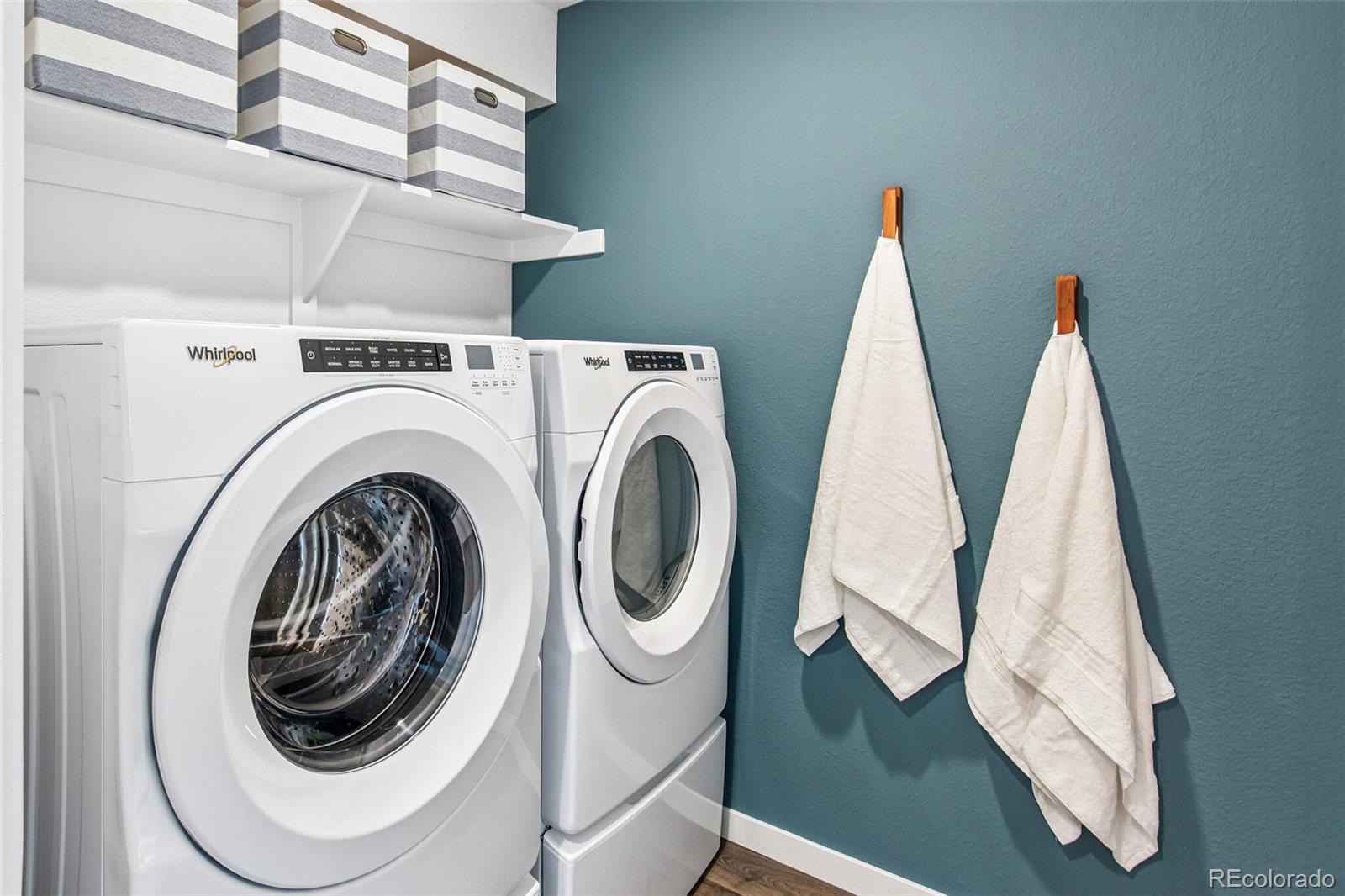 1349 South Chester Street, Unit A Denver, CO 80247 - Photo 12 of 15 a utility room with dryer and washer