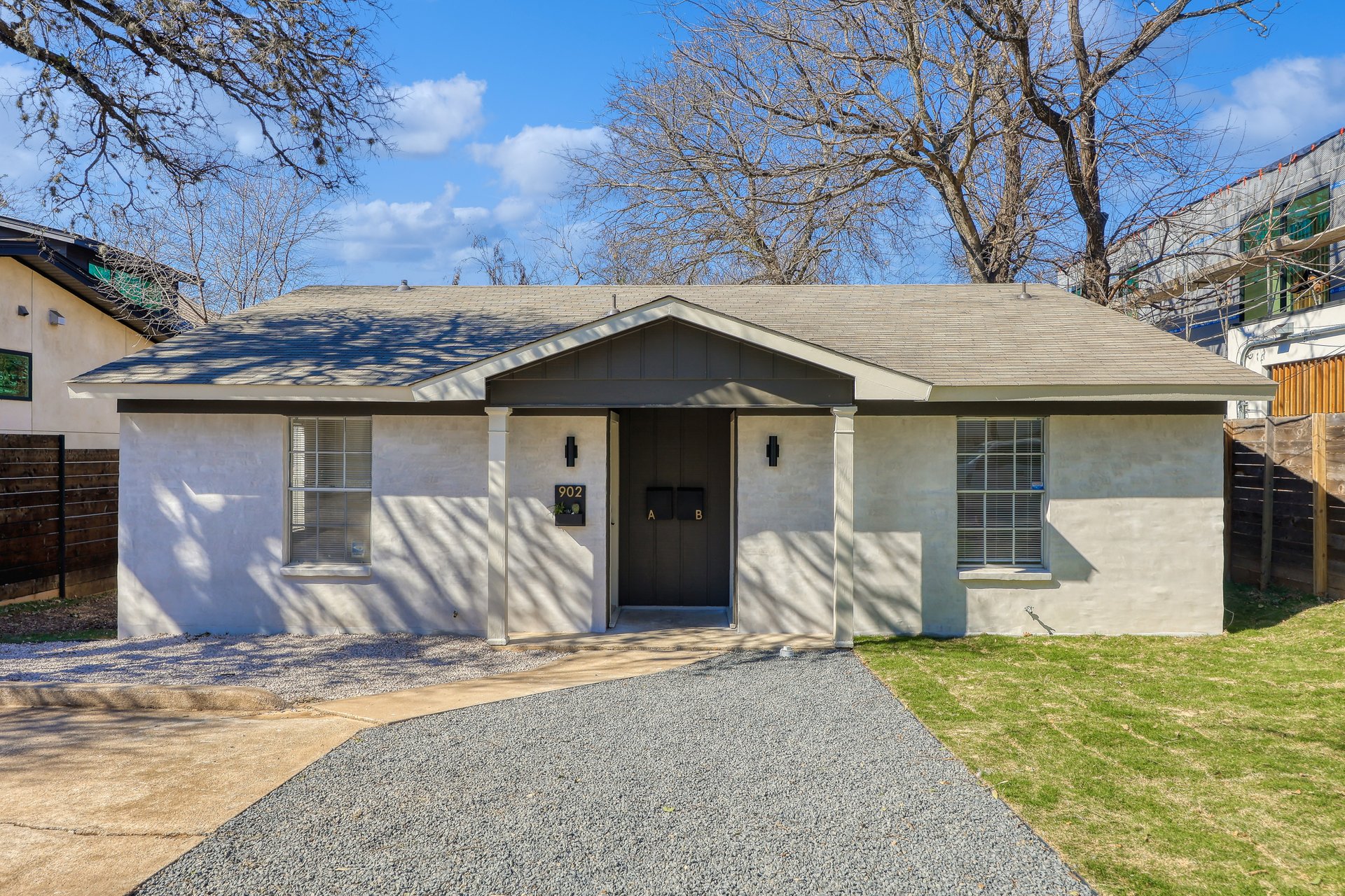 902 Jessie Street, Unit B Austin, TX 78704 - Photo 1 of 1 a front view of a house with garden