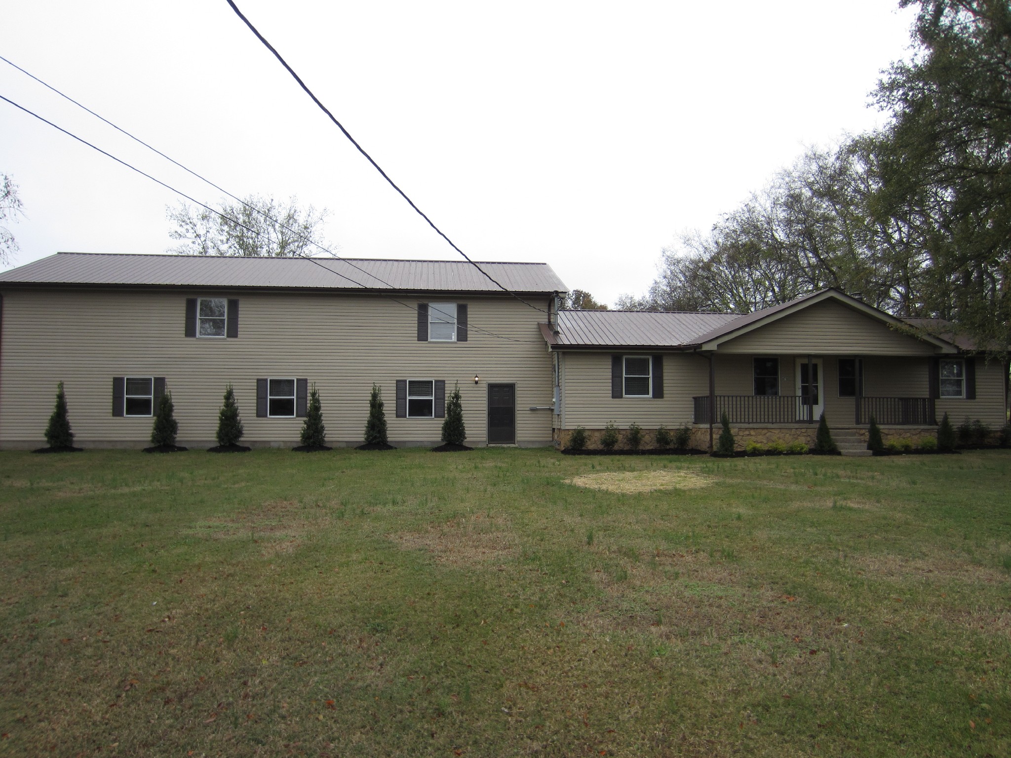 670 Vesta Road Lebanon, TN 37090 - Photo 1 of 20 a front view of a house with a garden