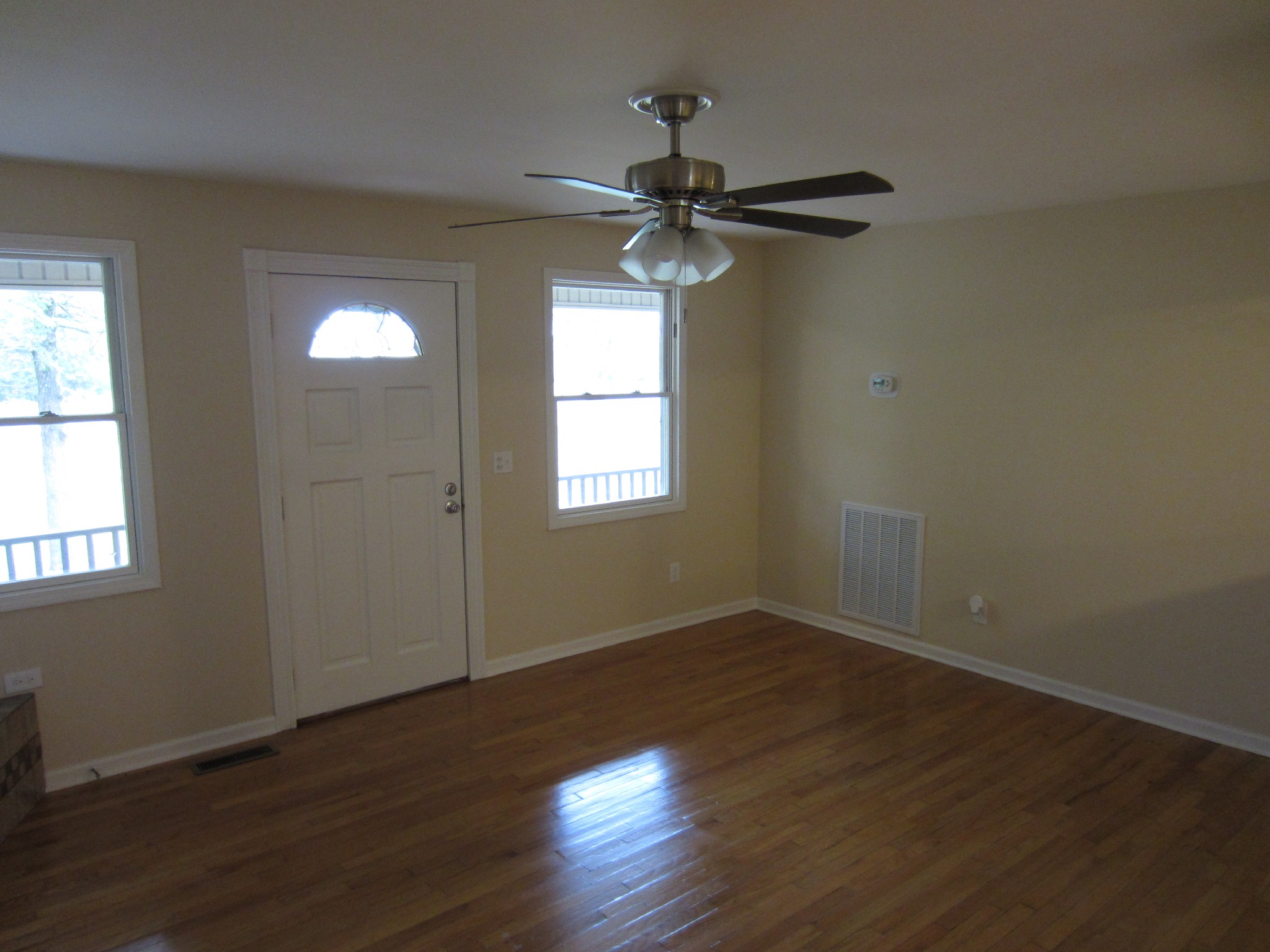 670 Vesta Road Lebanon, TN 37090 - Photo 11 of 20 a view of empty room with wooden floor and fan