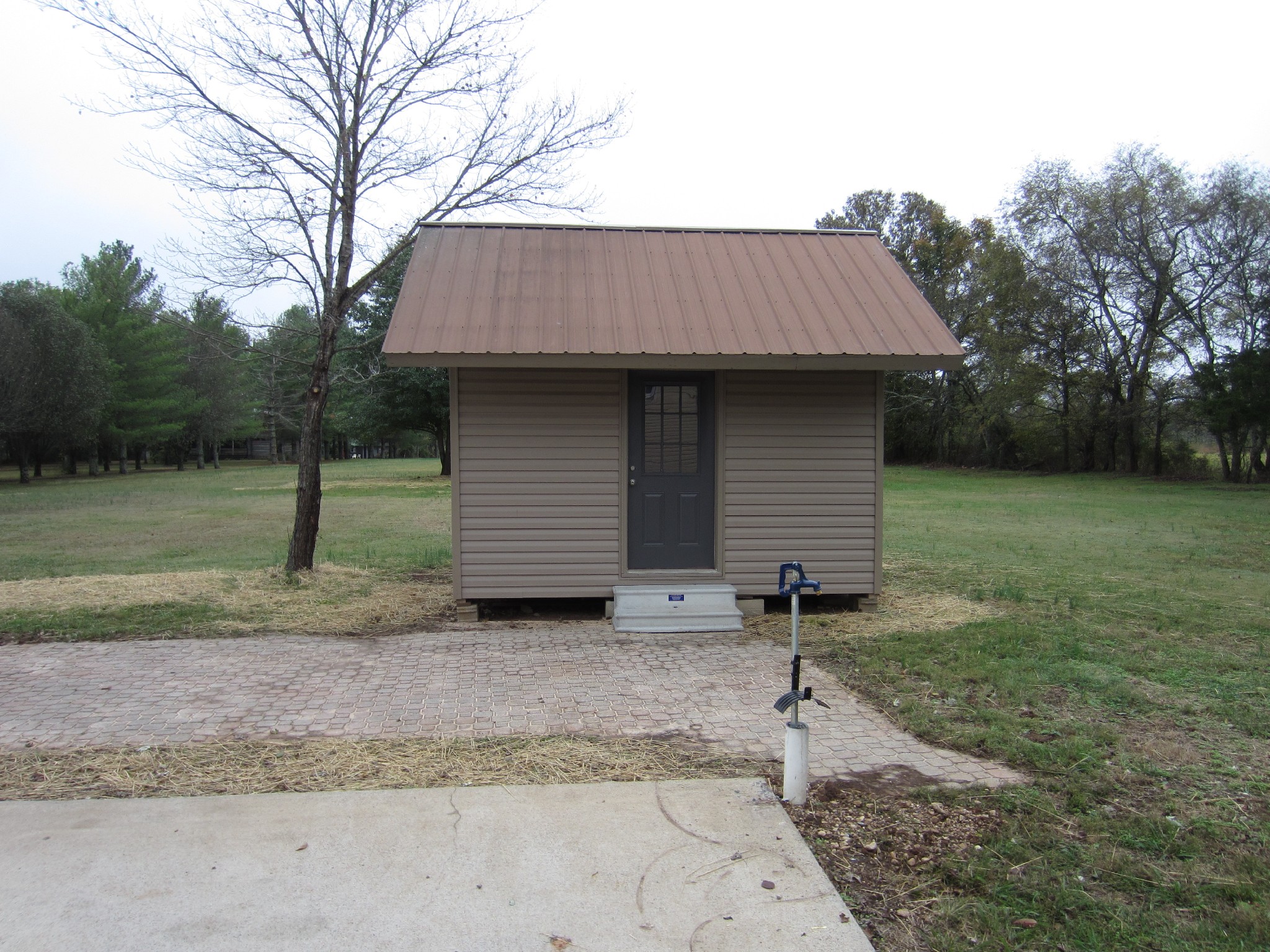 670 Vesta Road Lebanon, TN 37090 - Photo 8 of 20 a backyard of a house with barbeque oven