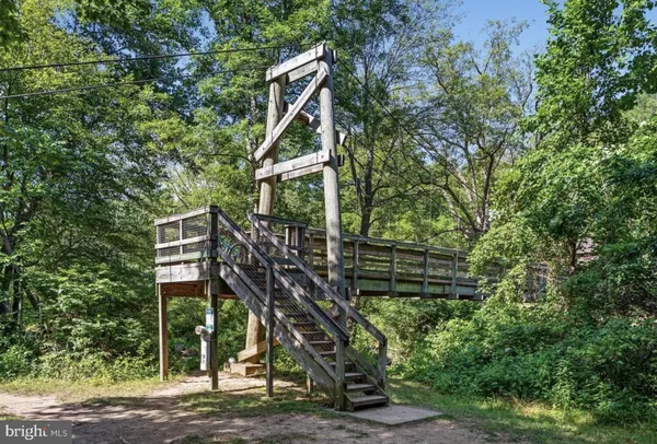 a view of a house with a small yard
