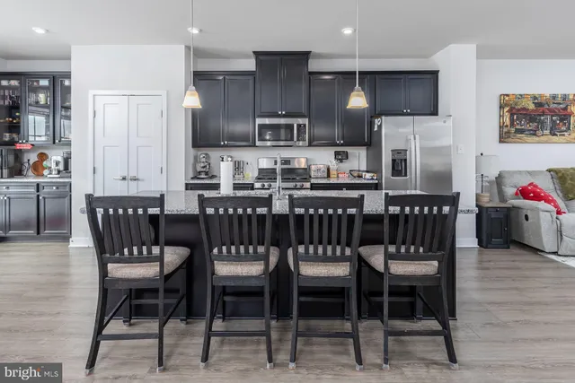 a view of a dining room with furniture