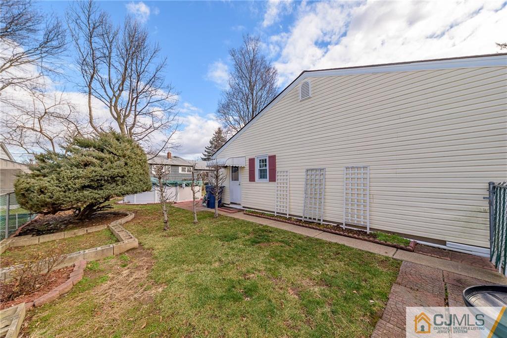 857 Hermann Road North Brunswick, NJ 08902 - Photo 21 of 25 a view of a house with a yard
