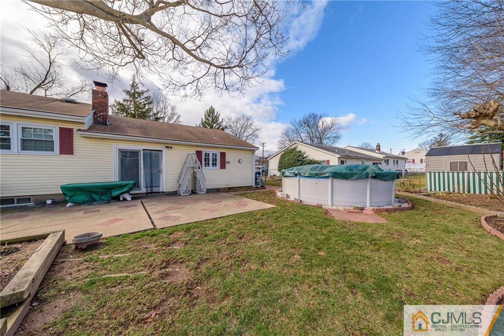 857 Hermann Road North Brunswick, NJ 08902 - Photo 24 of 25 a house view with a backyard space