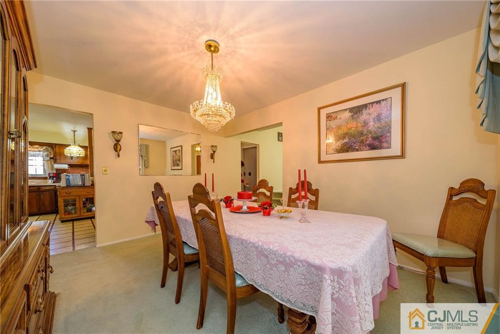 857 Hermann Road North Brunswick, NJ 08902 - Photo 4 of 25 a view of a dining room with furniture