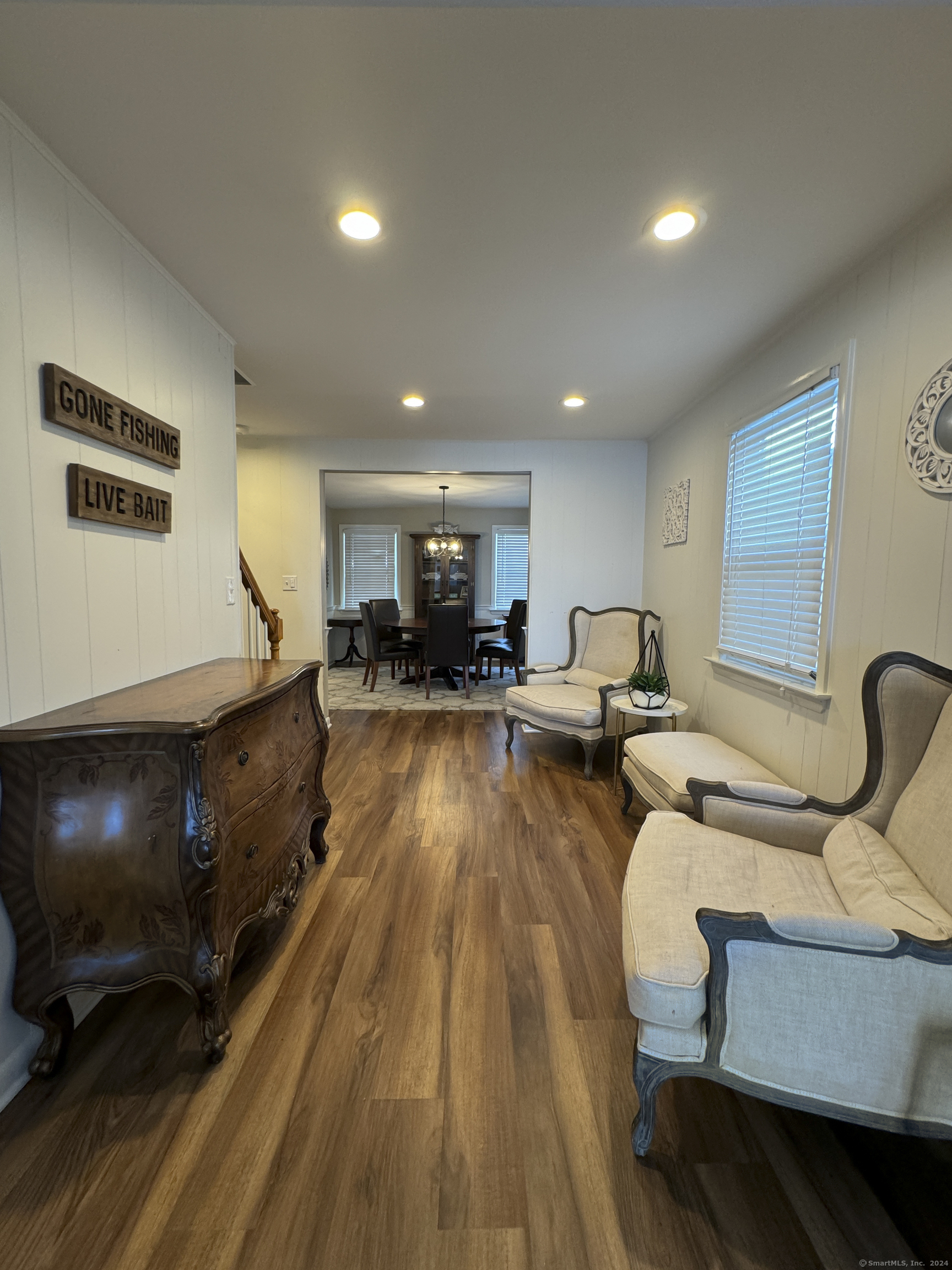 Undisclosed Address Fairfield, CT 06824 - Photo 12 of 23 a living room with furniture and a flat screen tv