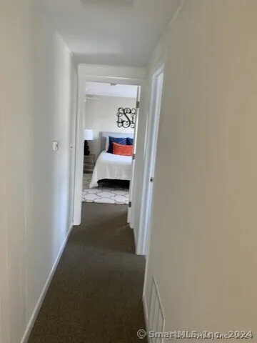 a bedroom with a bed