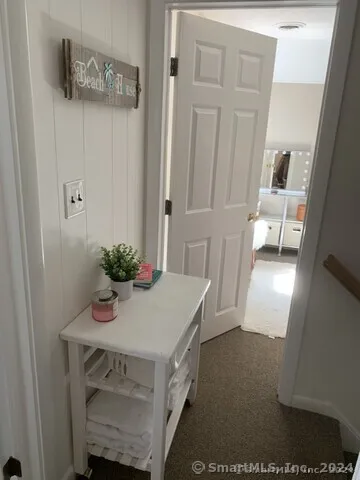 a room with a table and chairs