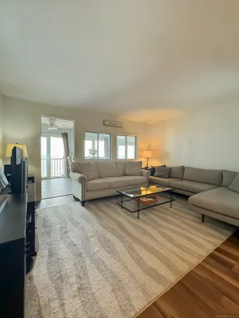 a living room with furniture and a couch