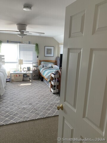 Undisclosed Address Fairfield, CT 06824 - Photo 17 of 23 a bed room with a bed furniture and a window