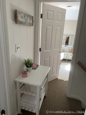 a room with a table and chairs