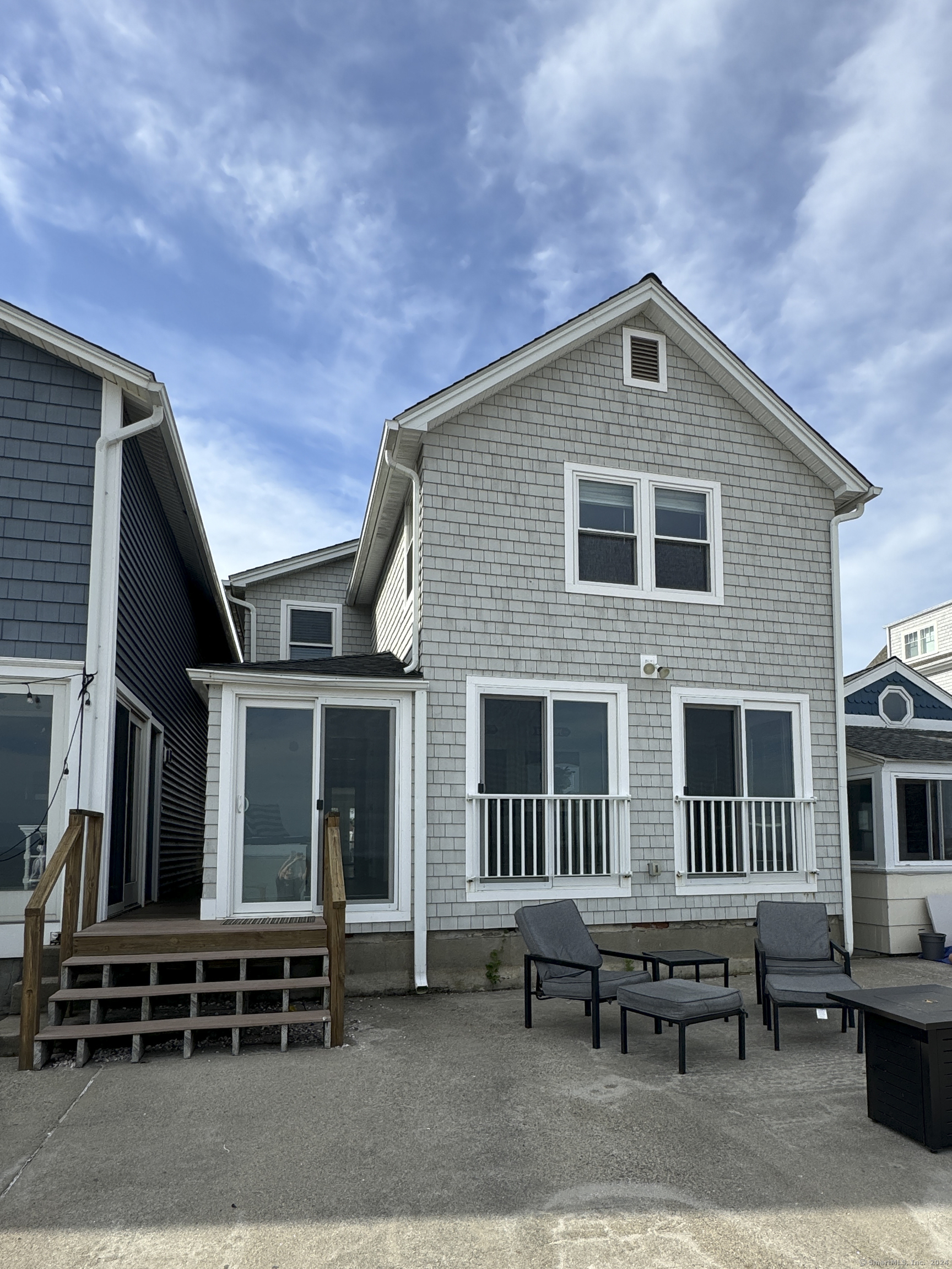 Undisclosed Address Fairfield, CT 06824 - Photo 3 of 23 a brick house with outdoor space