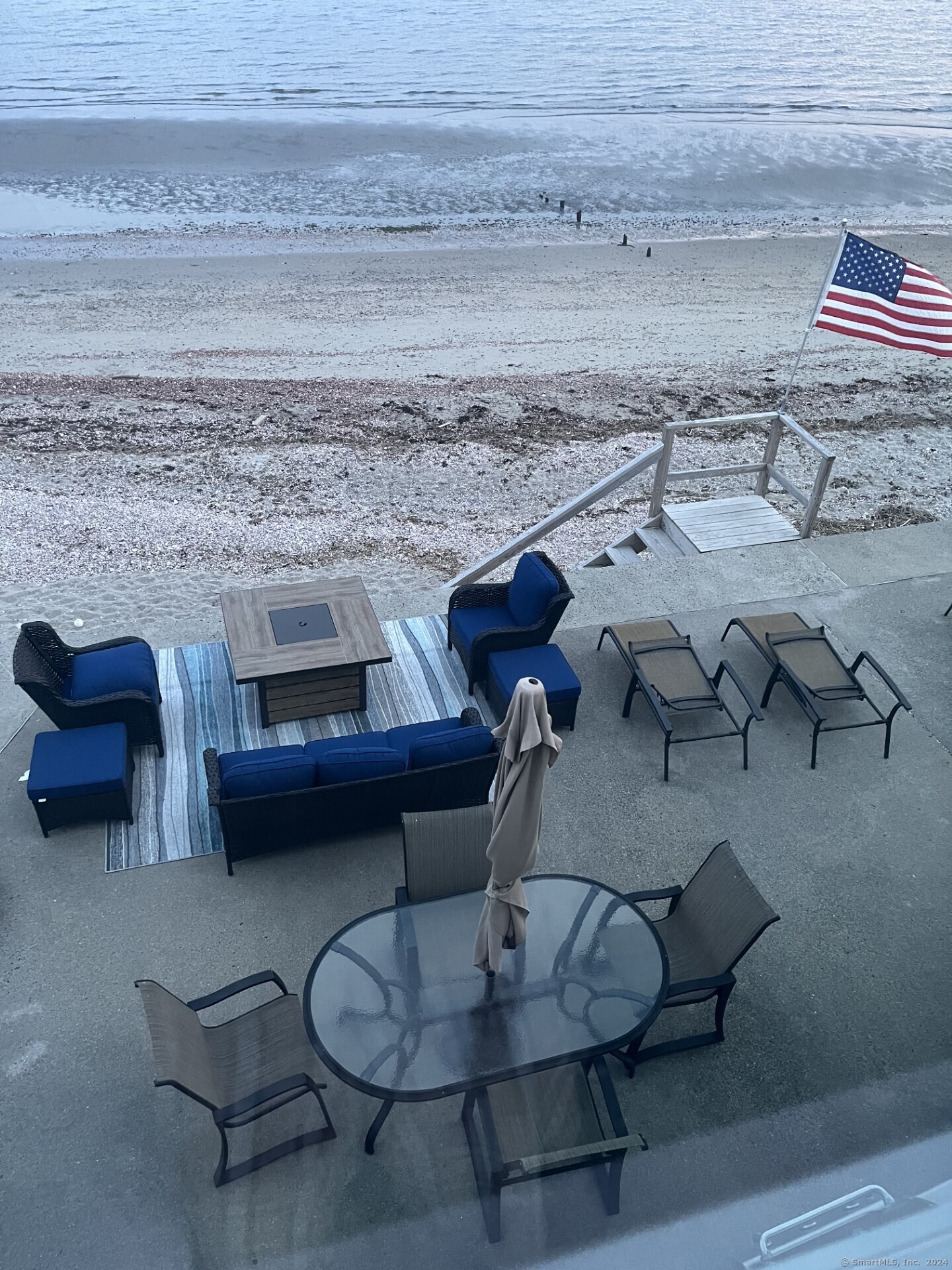 Undisclosed Address Fairfield, CT 06824 - Photo 4 of 23 a living room with furniture and a fireplace