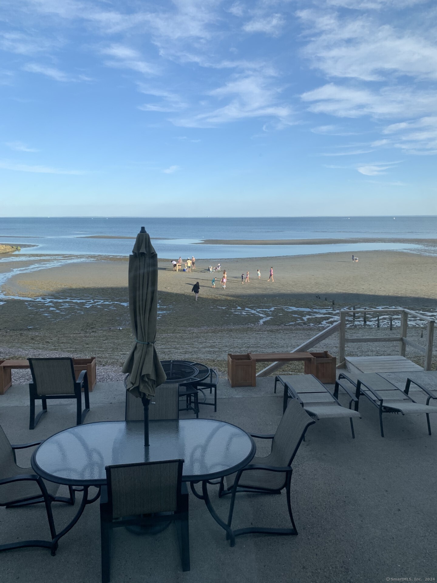 Undisclosed Address Fairfield, CT 06824 - Photo 5 of 23 a view of a chairs and table in the terrace