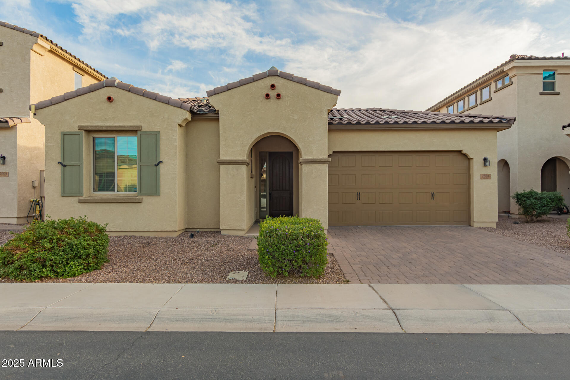 2891 Citrus Way Chandler, AZ 85286 - Photo 1 of 30 a view of a house with a small yard and a large window