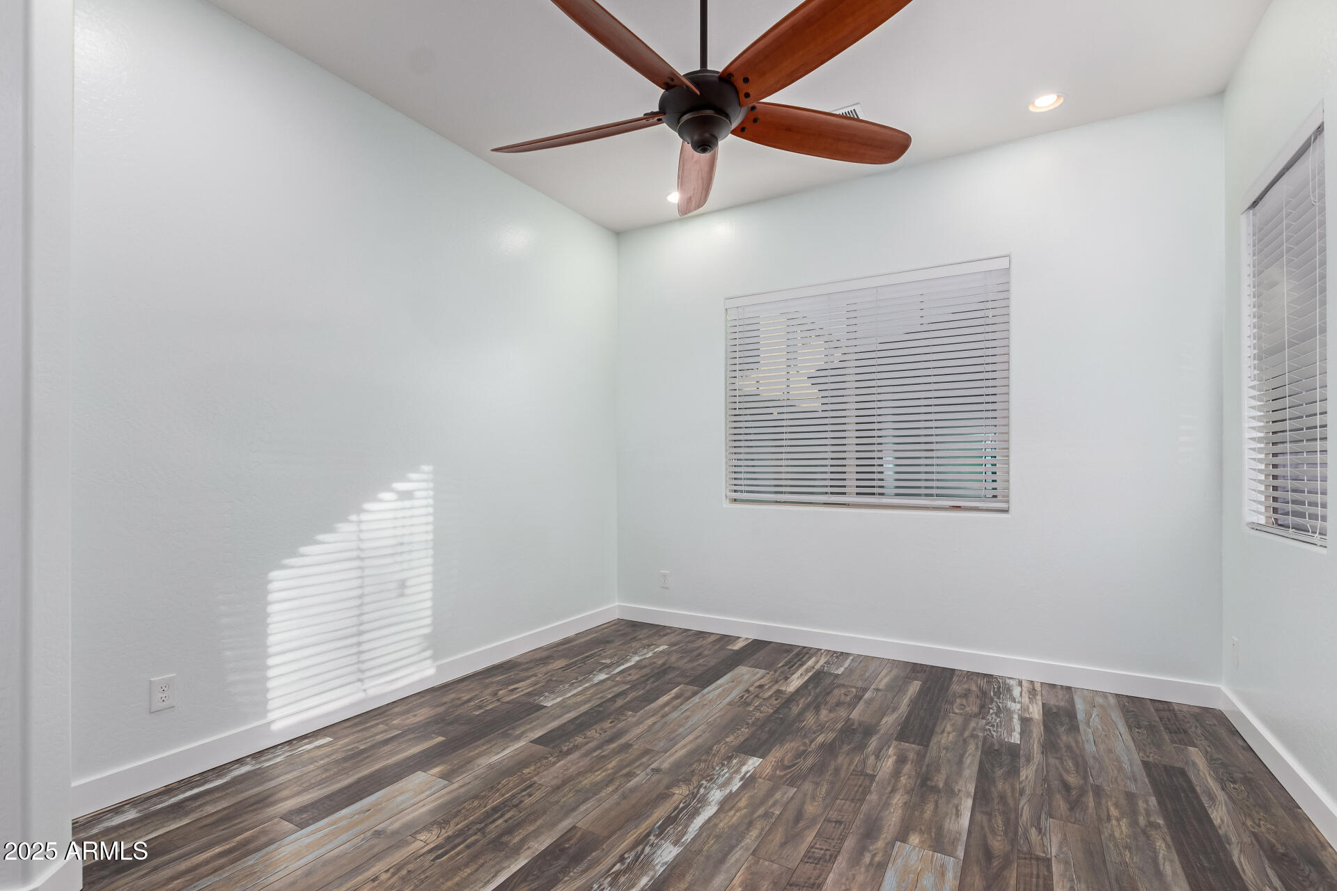 2891 Citrus Way Chandler, AZ 85286 - Photo 14 of 30 a view of empty room with wooden floor and fan