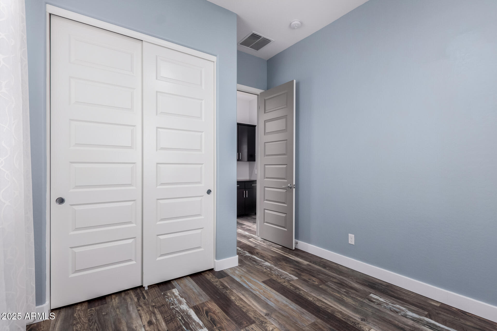 2891 Citrus Way Chandler, AZ 85286 - Photo 19 of 30 a view of walk in closet with empty racks