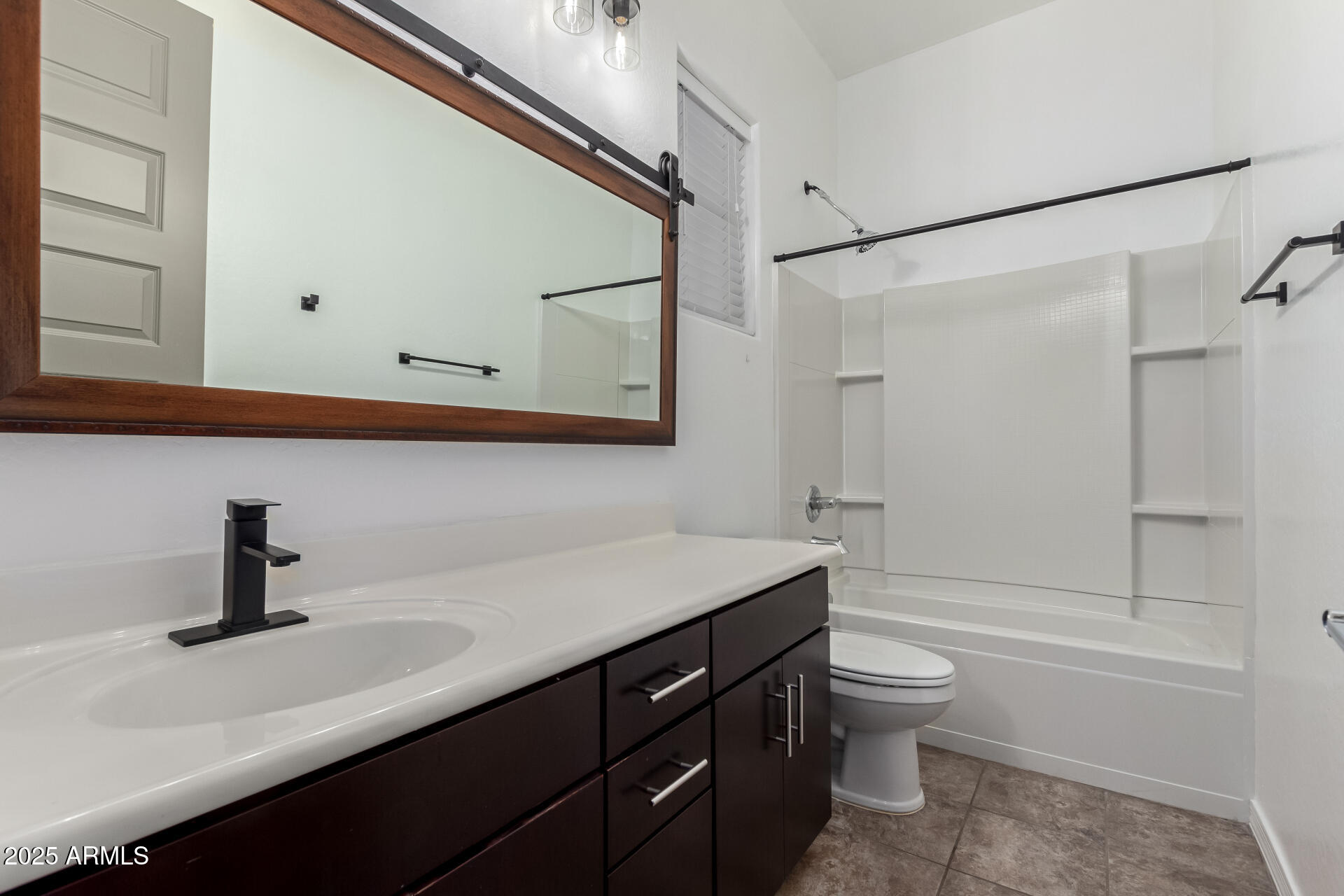 2891 Citrus Way Chandler, AZ 85286 - Photo 20 of 30 a bathroom with a sink a toilet and a bathtub