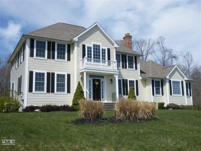 35 Marlin Road Newtown, CT 06482 - Photo 1 of 1 a front view of a house with a yard