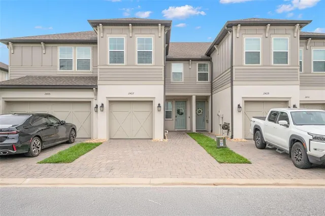 a car parked in front of a house