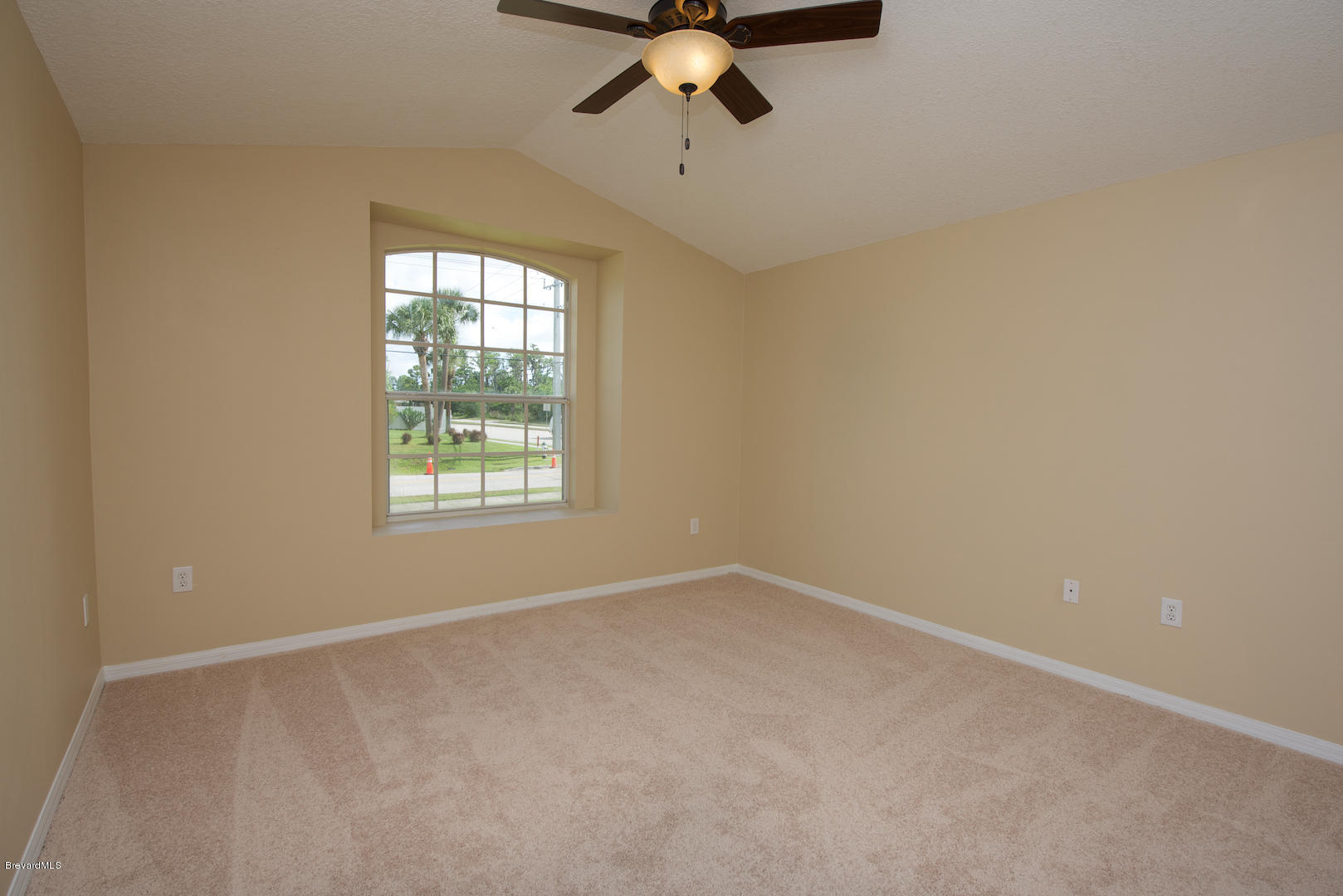 890 Raleigh Road Southeast Palm Bay, FL 32909 - Photo 11 of 20 masterbedroom