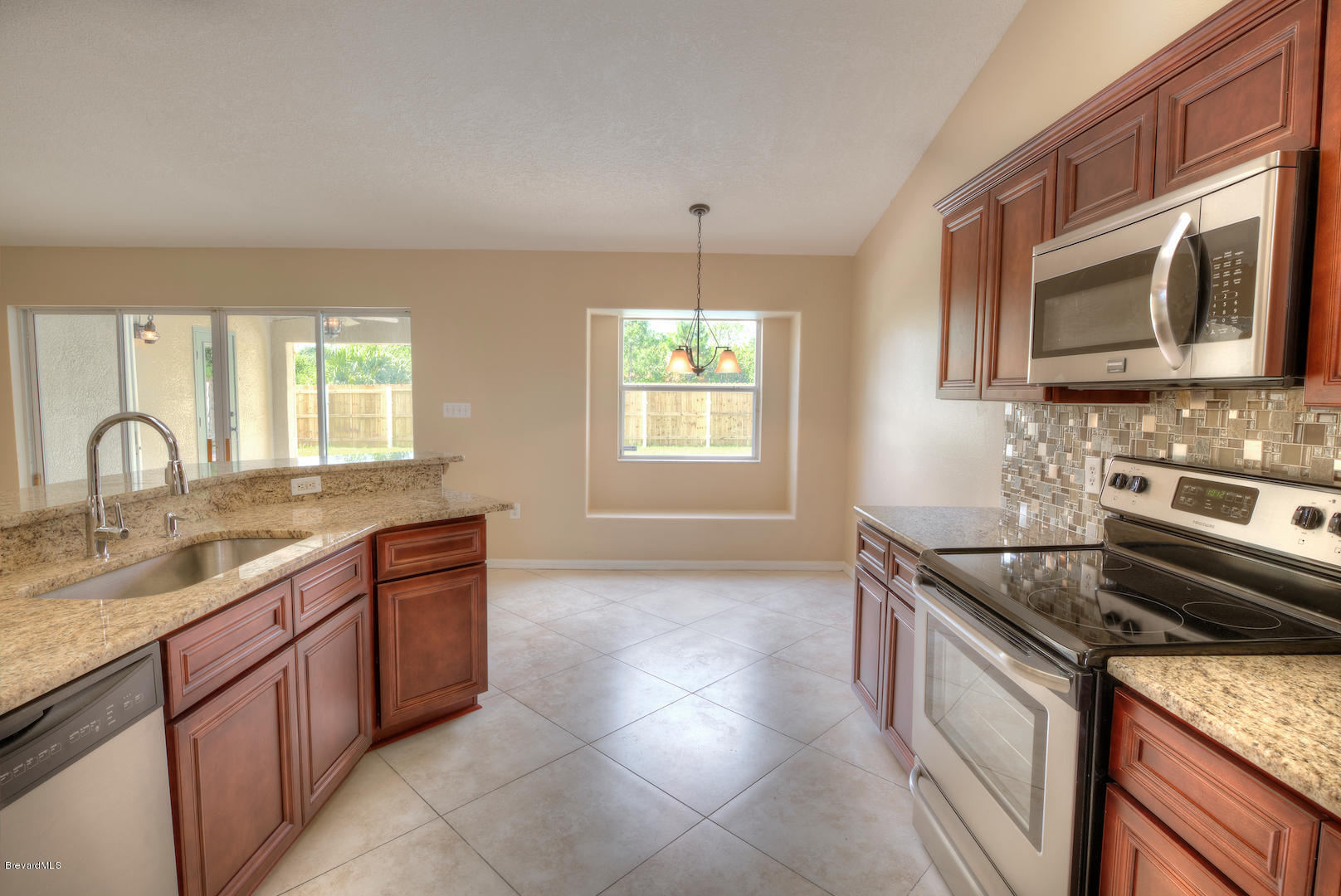 890 Raleigh Road Southeast Palm Bay, FL 32909 - Photo 5 of 20 kitchen3