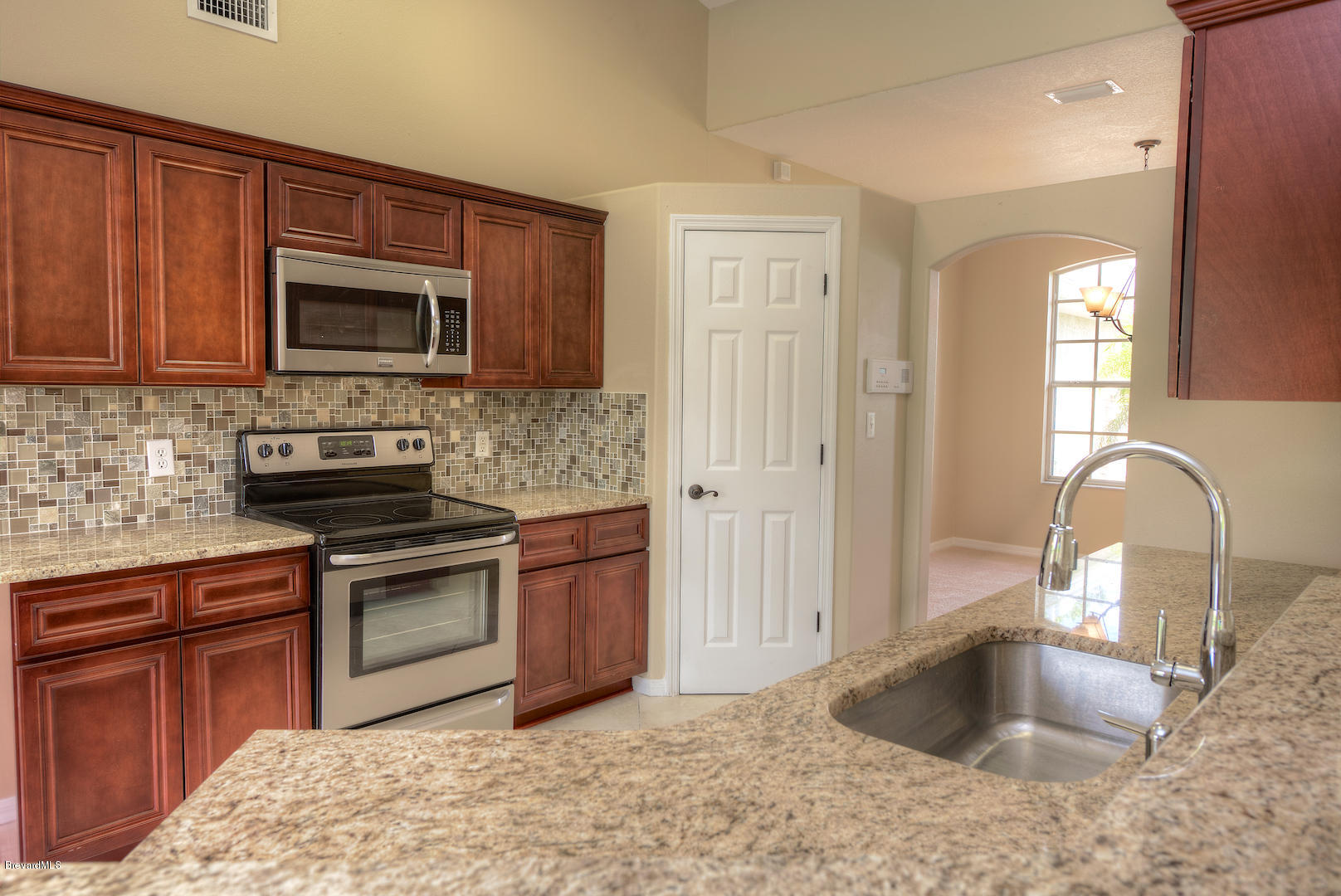 890 Raleigh Road Southeast Palm Bay, FL 32909 - Photo 6 of 20 kitchen4
