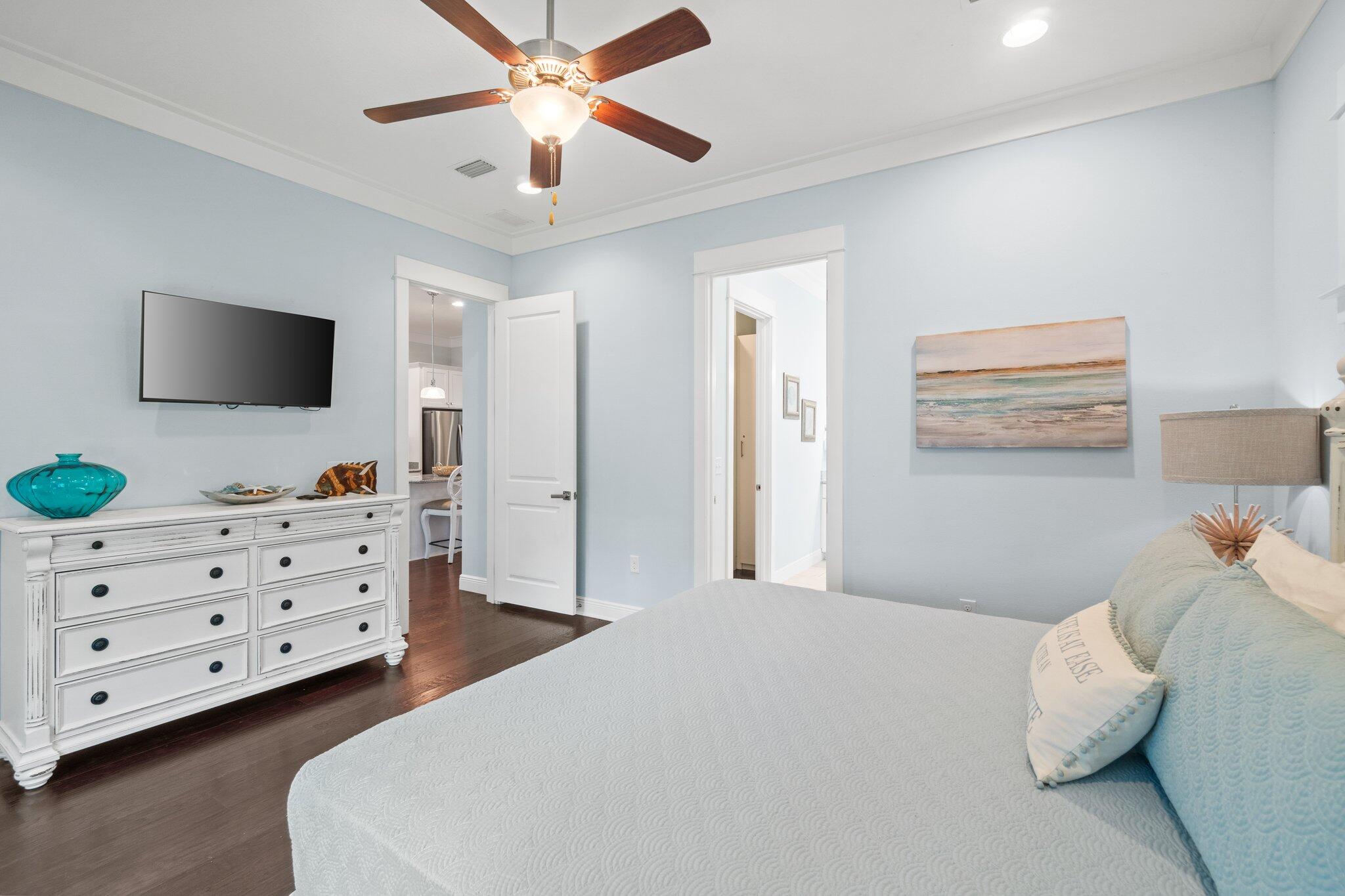 359 Grande Pointe Circle Inlet Beach, FL 32461 - Photo 10 of 36 a bedroom with a bed window and a flat screen tv