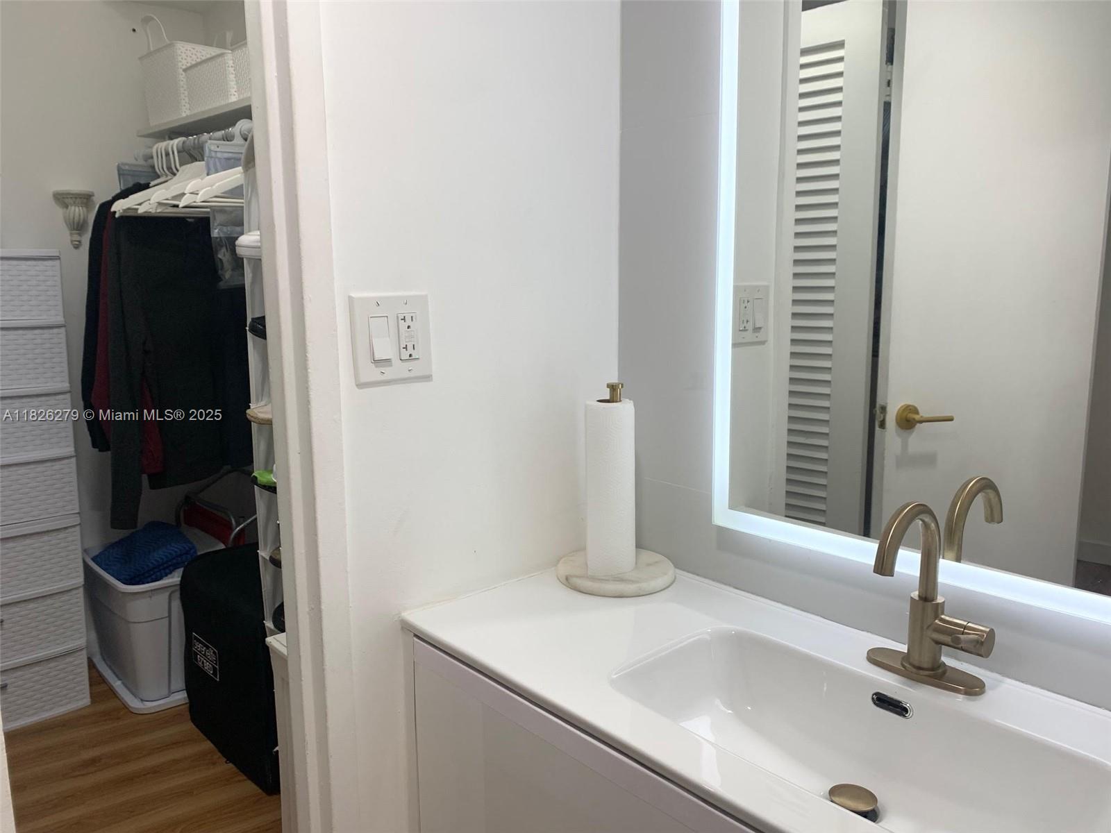 100 Lincoln Road, Unit 315 Miami Beach, FL 33139 - Photo 12 of 16 a bathroom with a sink and a toilet