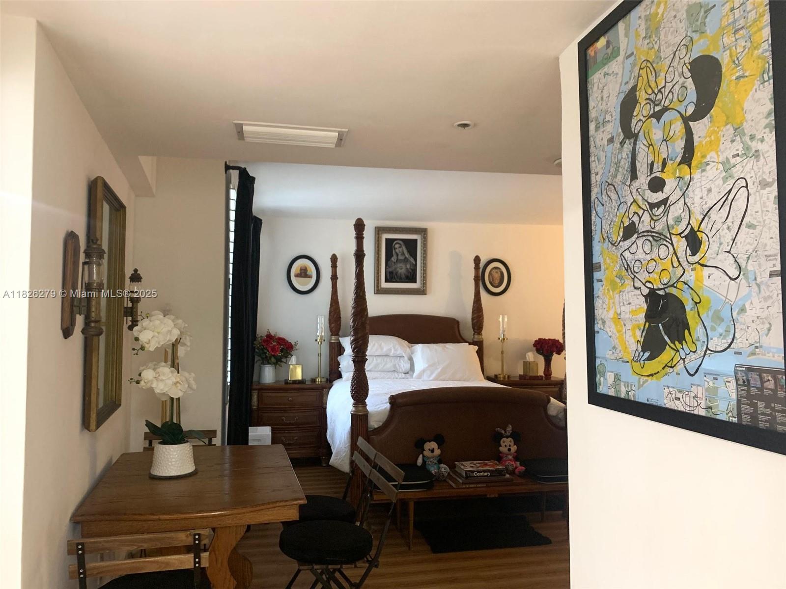 100 Lincoln Road, Unit 315 Miami Beach, FL 33139 - Photo 10 of 16 a living room with furniture and a window
