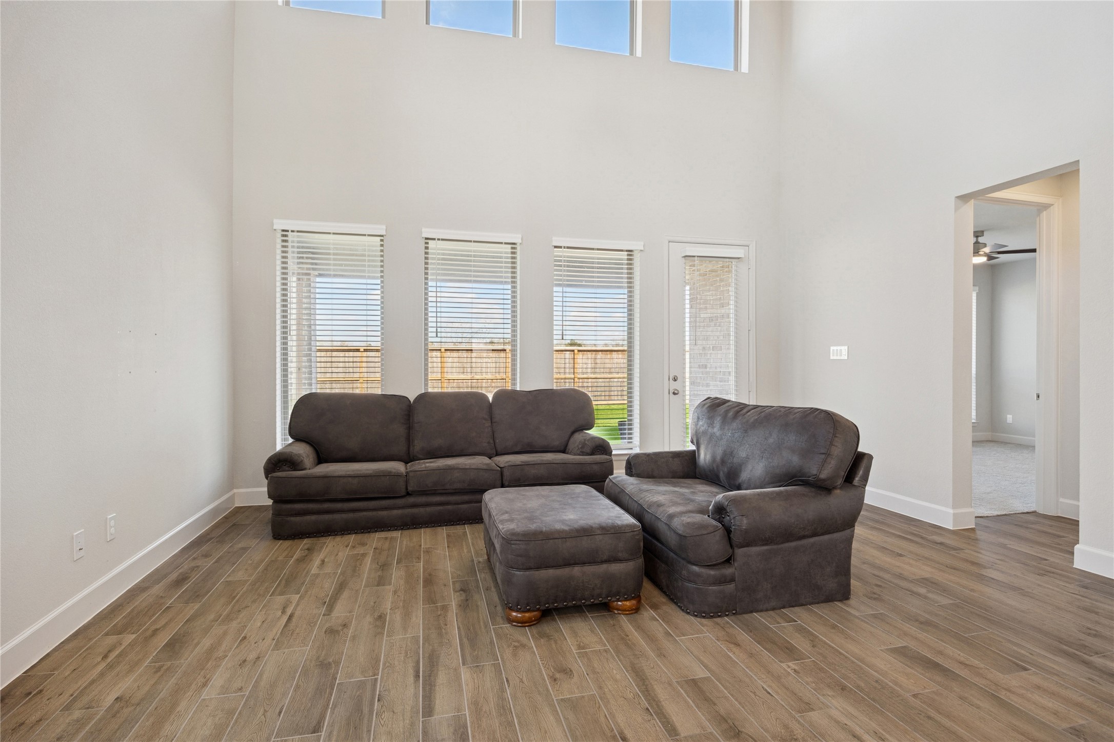 19007 Satsuma Rdg Drive Manvel, TX 77578 - Photo 7 of 15 a living room with furniture and a wooden floor