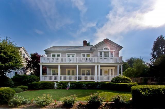 46 Rowland Road Fairfield, CT 06824 - Photo 1 of 1 a front view of a house with a garden and plants