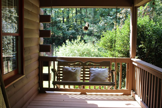 543 Mountain Shadows Road Hamilton, GA 31811 - Photo 6 of 36 front porch swing