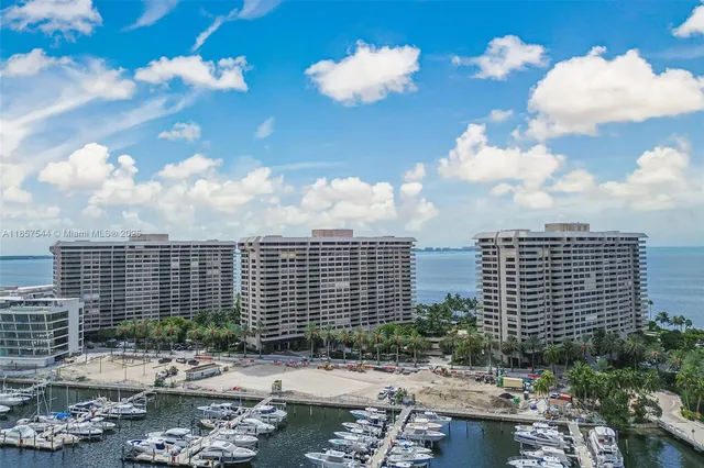 a view of a swimming pool with a table and chairs