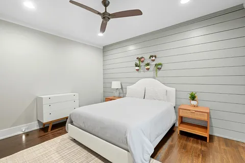a bathroom with a sink a toilet and shower curtain