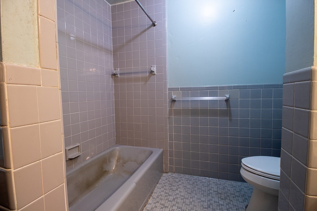 22 Hamilton Road, Unit 206 Arlington, MA 02474 - Photo 13 of 20 a bathroom with a toilet and shower