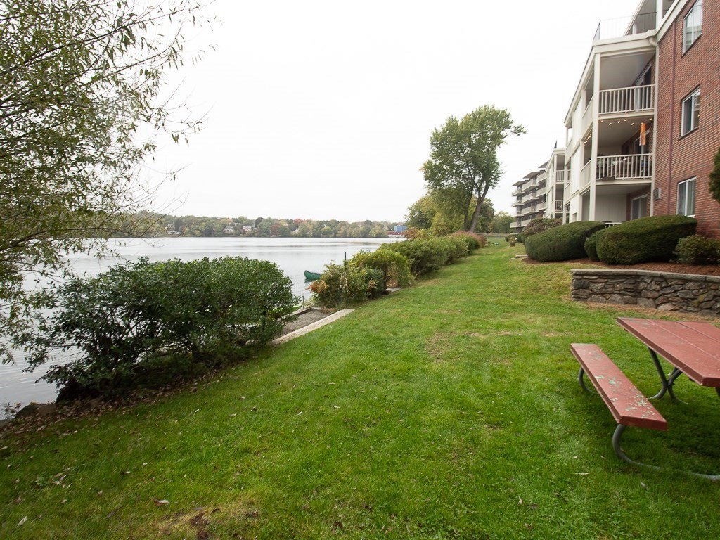 22 Hamilton Road, Unit 206 Arlington, MA 02474 - Photo 20 of 20 a view of a lake with a yard