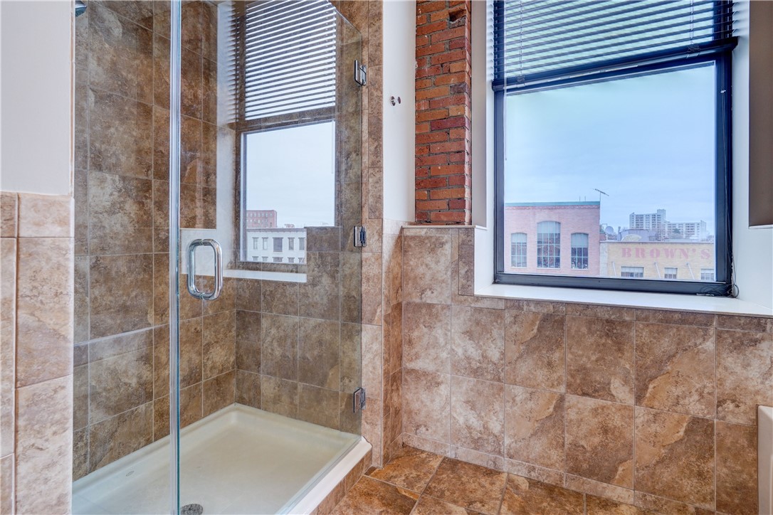 224 Mill Street, Unit 3A Rochester, NY 14614 - Photo 9 of 15 Tiled shower