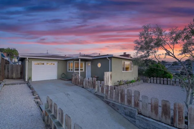 a front view of a house having yard
