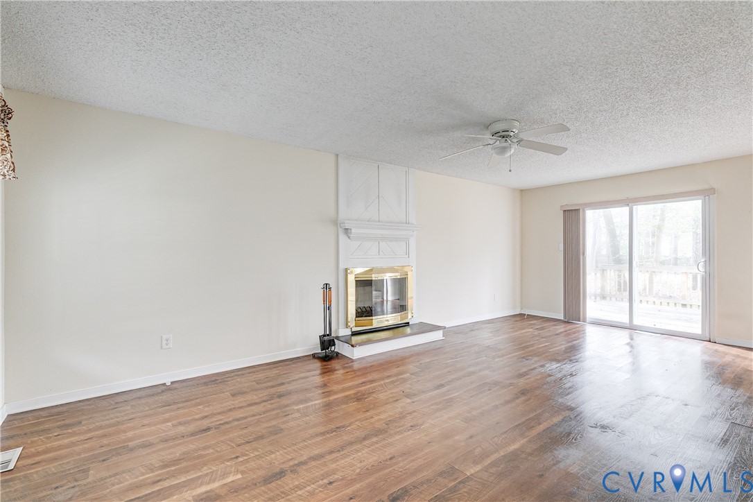 600 Queensway Road Chesterfield, VA 23236 - Photo 12 of 33 a view of a livingroom with wooden floor