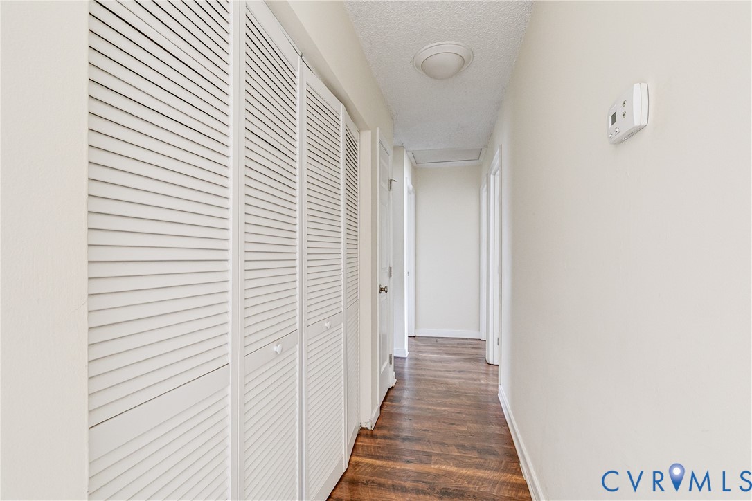 600 Queensway Road Chesterfield, VA 23236 - Photo 20 of 33 a view of a hallway with wooden floor