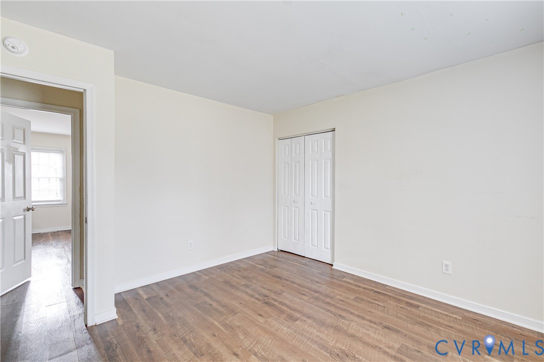 600 Queensway Road Chesterfield, VA 23236 - Photo 24 of 33 a view of an empty room with wooden floor