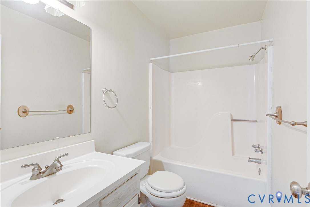 600 Queensway Road Chesterfield, VA 23236 - Photo 29 of 33 a bathroom with a sink toilet and shower