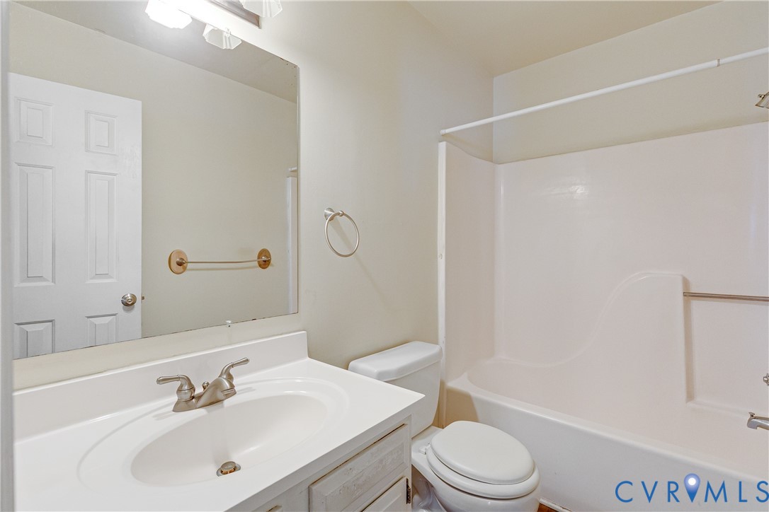 600 Queensway Road Chesterfield, VA 23236 - Photo 4 of 33 a bathroom with a sink a toilet and shower