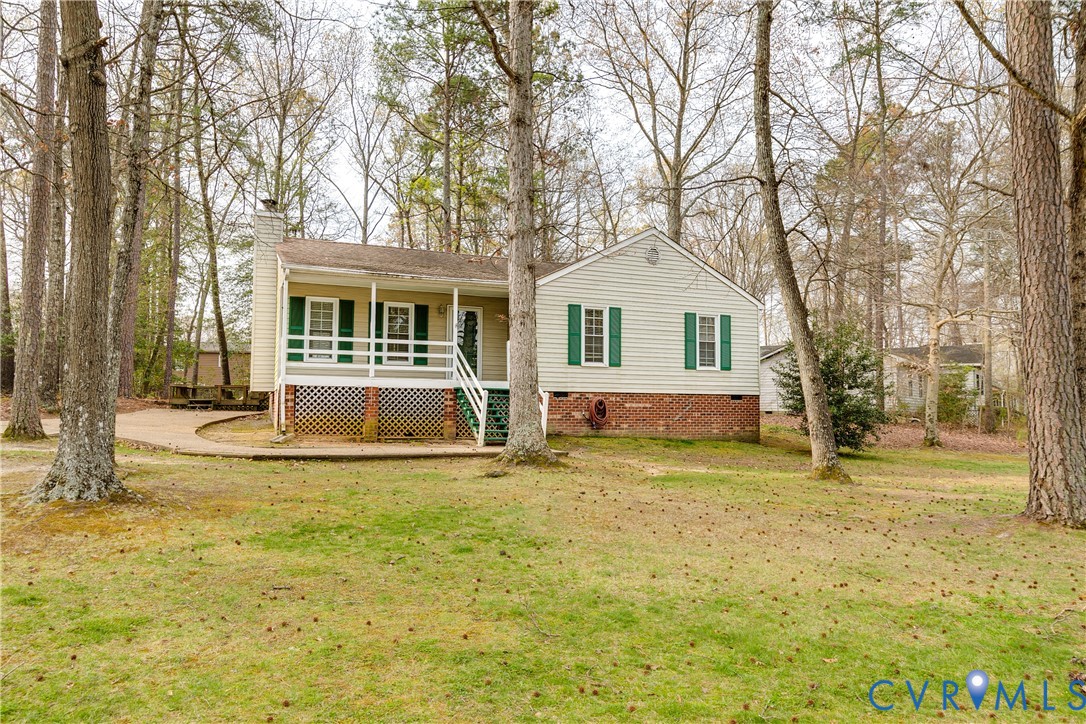 600 Queensway Road Chesterfield, VA 23236 - Photo 7 of 33 a house that has a tree in front of the house