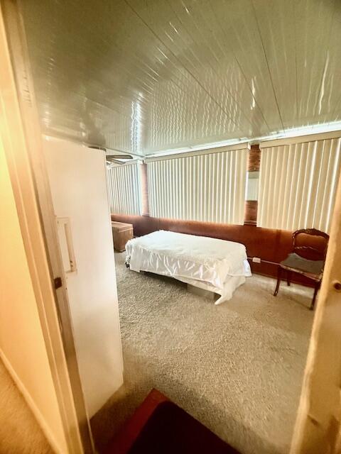 51555 Monroe Street Indio, CA 92201 - Photo 11 of 30 a bedroom with a bed and wooden floor